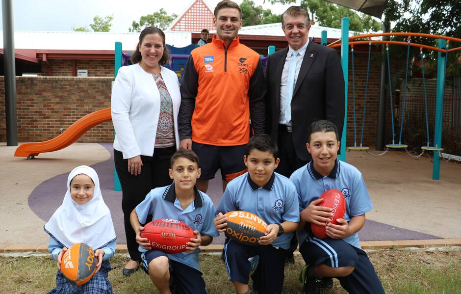 More than 3000 multicultural students across 20 schools in Western Sydney will get closer to the GIANTS than ever before thanks to a new community program named after two of the club’s stars. GIANTS star Stephen Coniglio with Member for Holsworthy Melanie Gibbons, Minister for Multiculturalism Ray William and students from Unity Grammar Austral in Casula. - AFL,AFLW,Stephen Coniglio,Amanda Farrugia